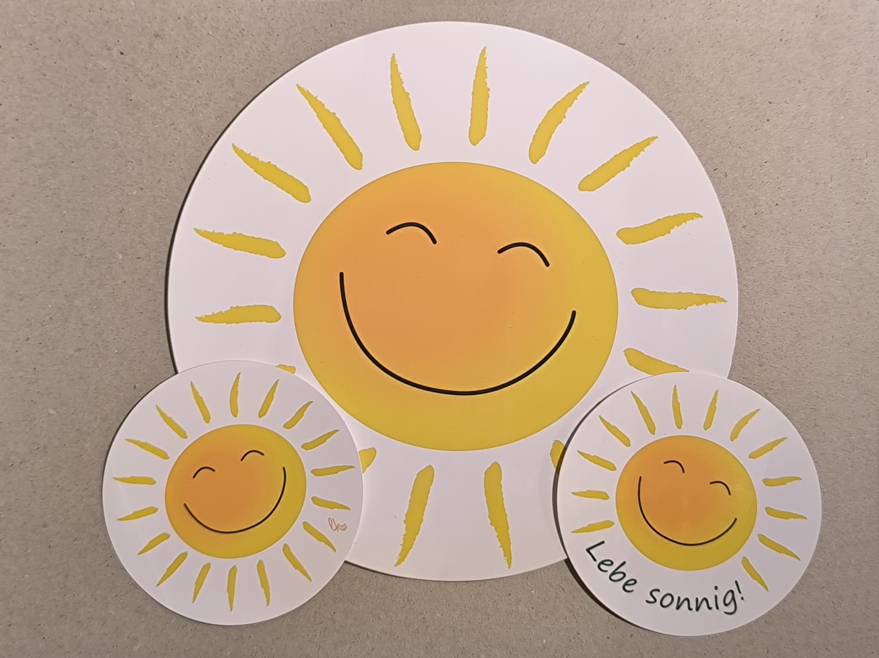 drei Varianten von runden Sonnenaufklebern